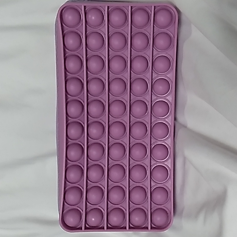 7.5 x 3.5 x 1.5 inches Purple Pop It  Case